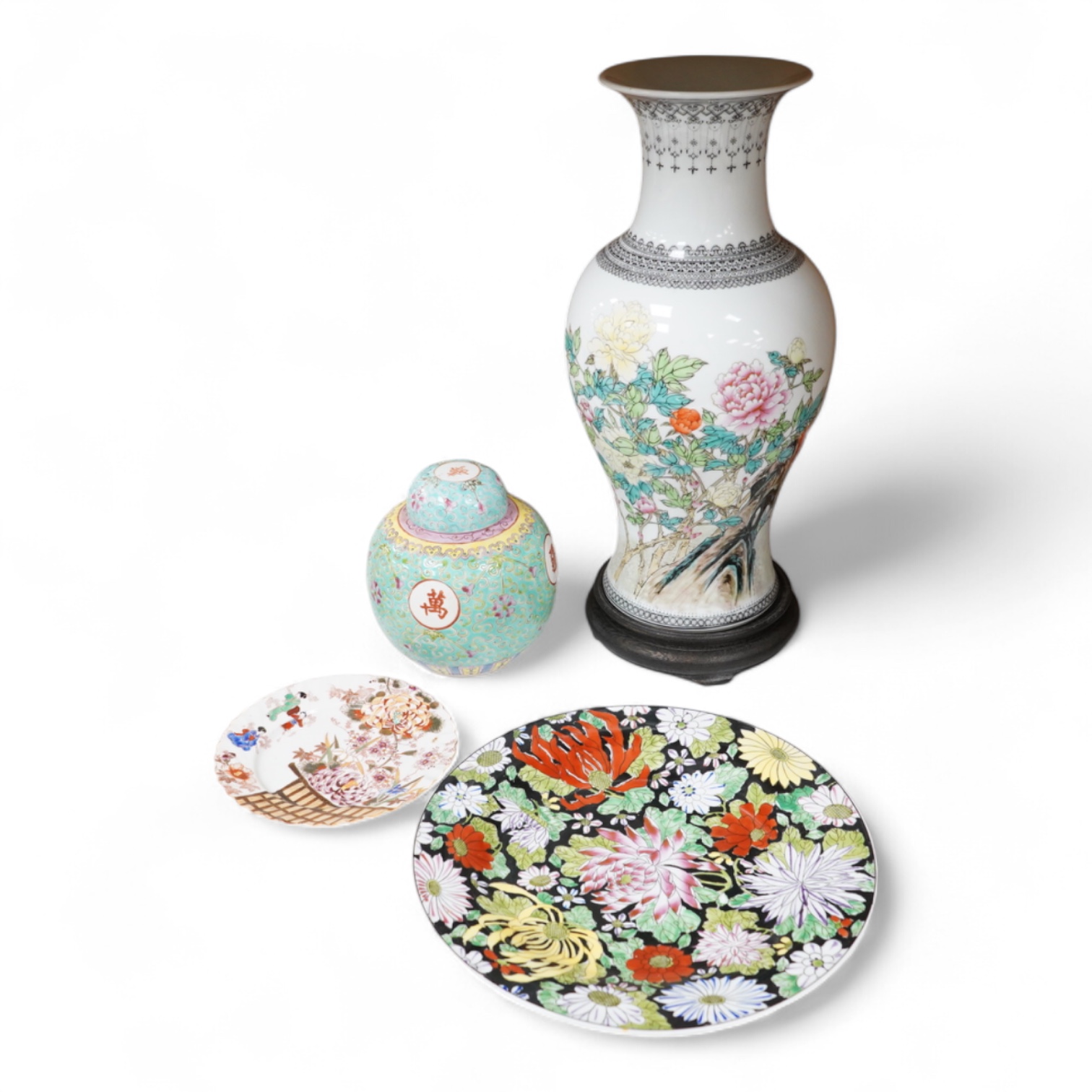 A collection of Chinese ceramics to include enamelled ginger jar and cover, floral plate and a vase, largest 40cm high